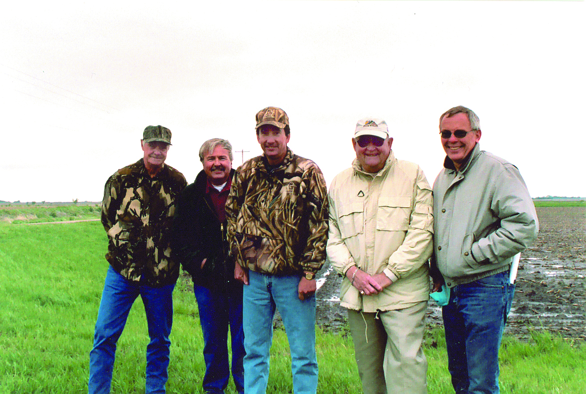  Landowners Frank Hill, Larry Rouse, Don Cox, and Leo Pavelka worked with NRCS Resource Conservationist Ken Franzen and other partner agencies to help restore the large wetland near Trumbull, Nebraska. Photo taken in 2004 by Joanna Pope, NRCS.