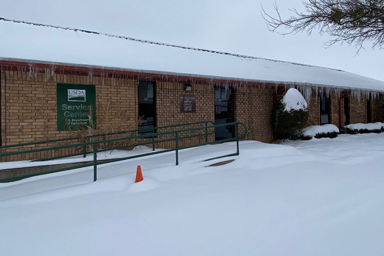 Snow blankets the USDA Service Center in Clay County, Texas.