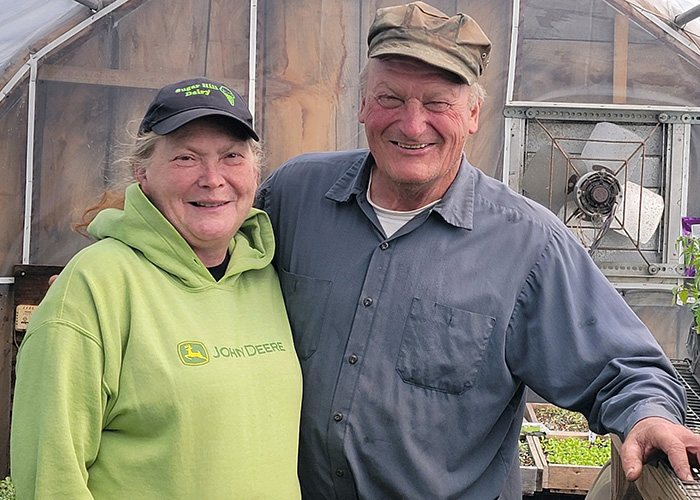 Two people smiling
