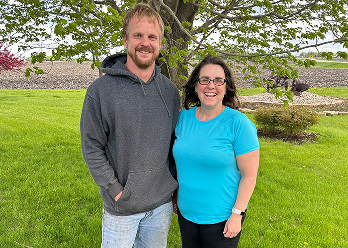 Two people smiling