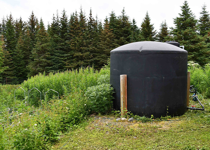 Water tank in a field