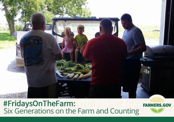 Truck with children in the back with produce